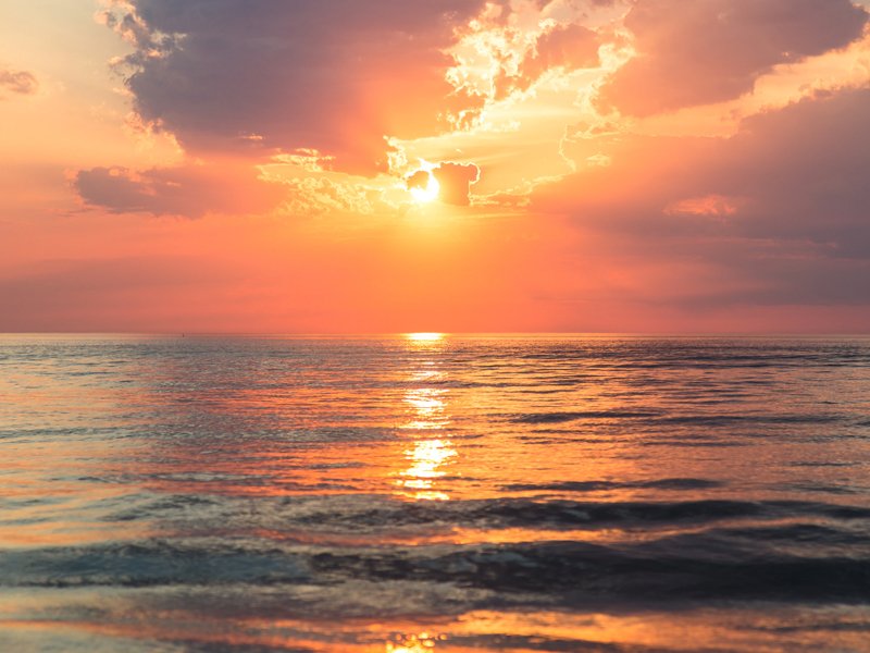 Sunset Over The Sea